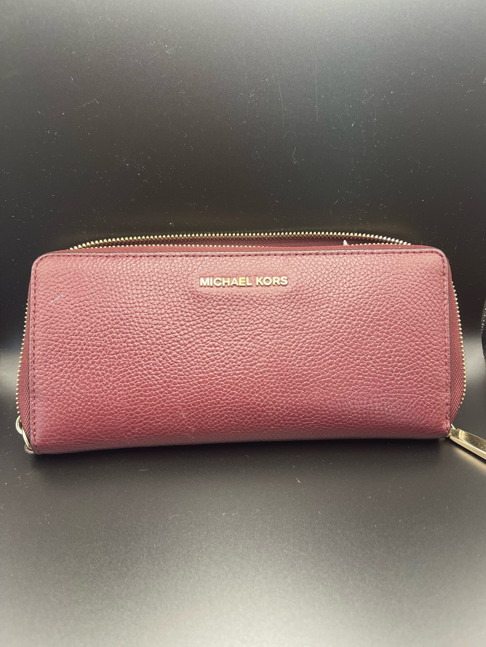 Michael Kors Oxblood Zip-Around Pebbled Leather Wallet with Gold Hardware